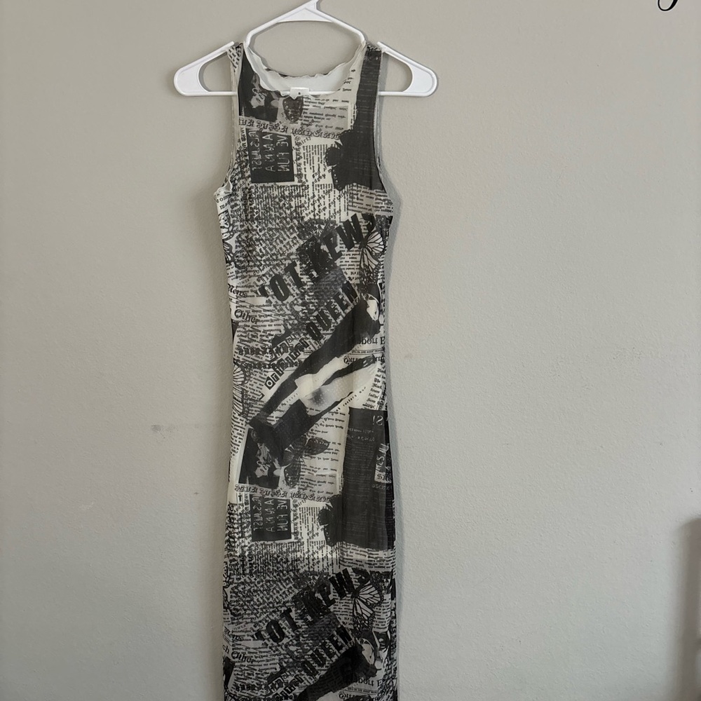 Chic Black and White Sleeveless Halter Midi Dress